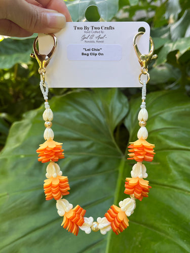 Ilima, Pua Kalaunu, & Pikake Bag Lei
