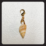 Shell Charm (gold colored hardware)